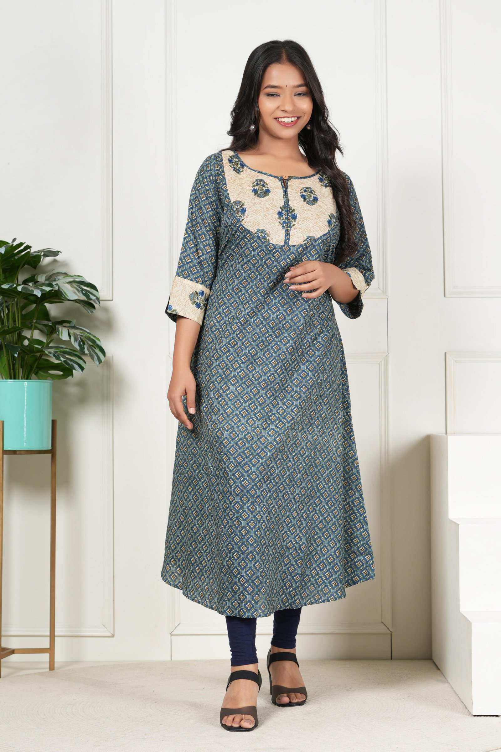 <b>Rina</b><br/>Teal Green A Line Cotton Kurti